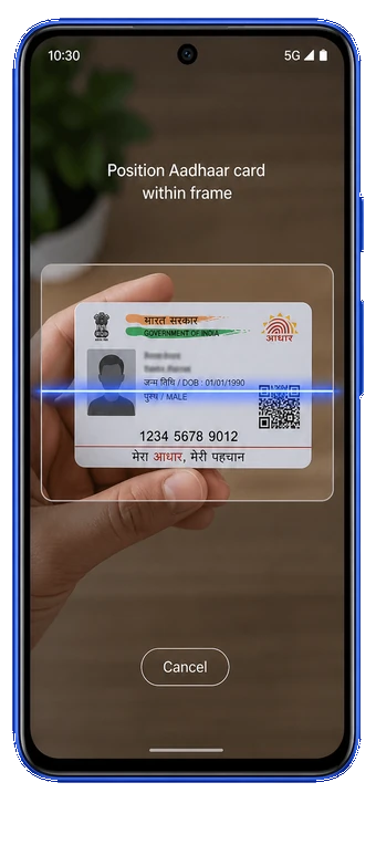 Phone camera scanning an Aadhaar card for an ID check.